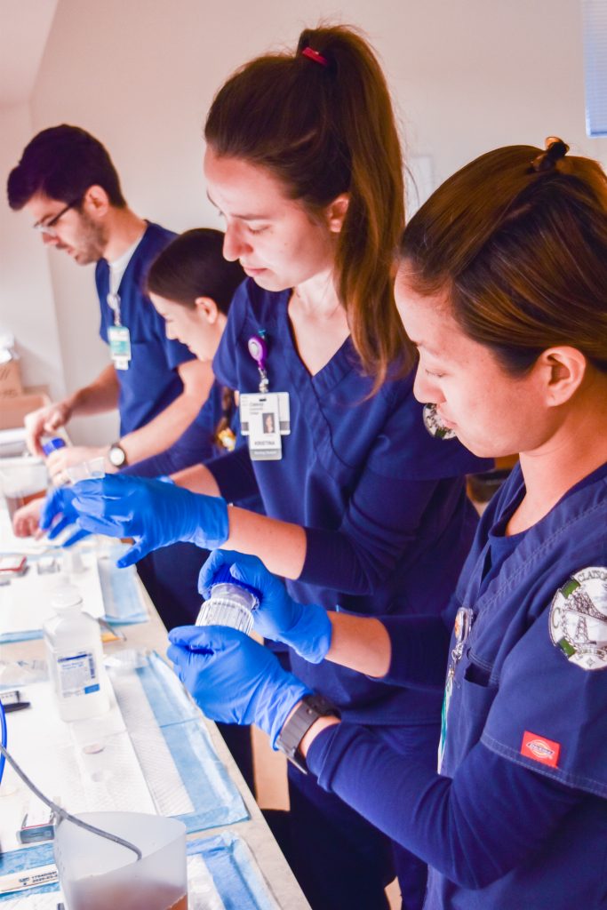 Nursing students working in lab class