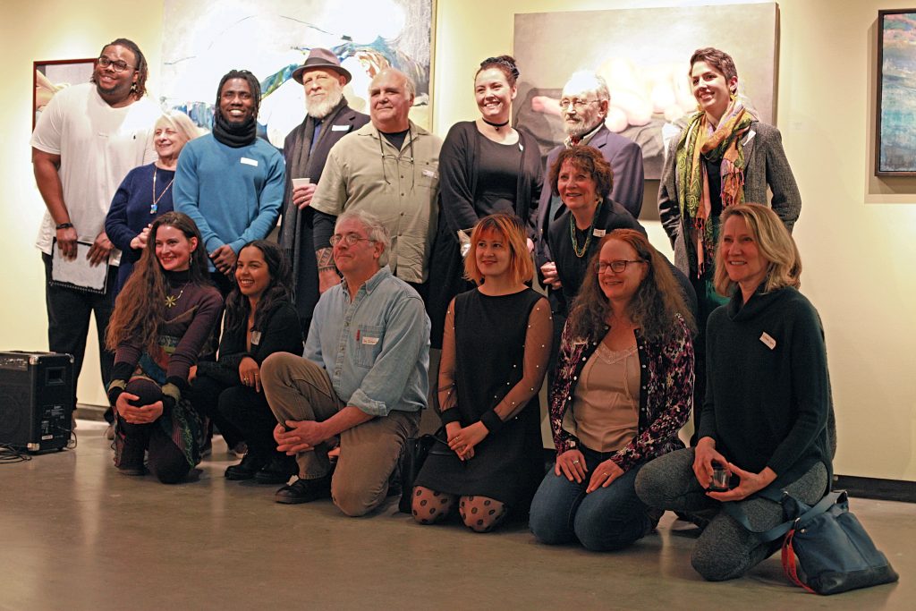 Artists who participated in the 2019 Au Naturel art exhibit pose for a photo