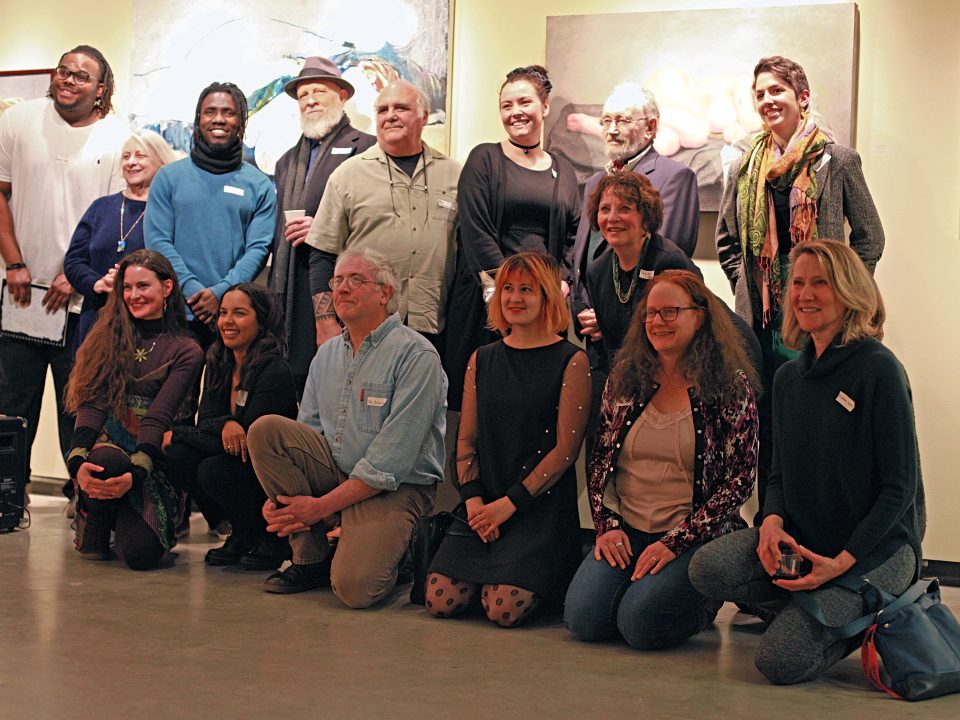 Artists who participated in the 2019 Au Naturel art exhibit pose for a photo