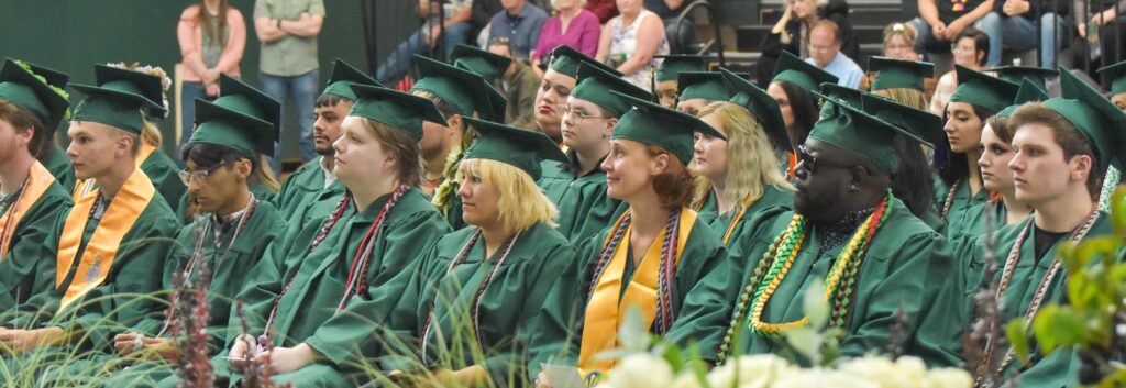 Graduates sit during the 2023 commencement ceremony