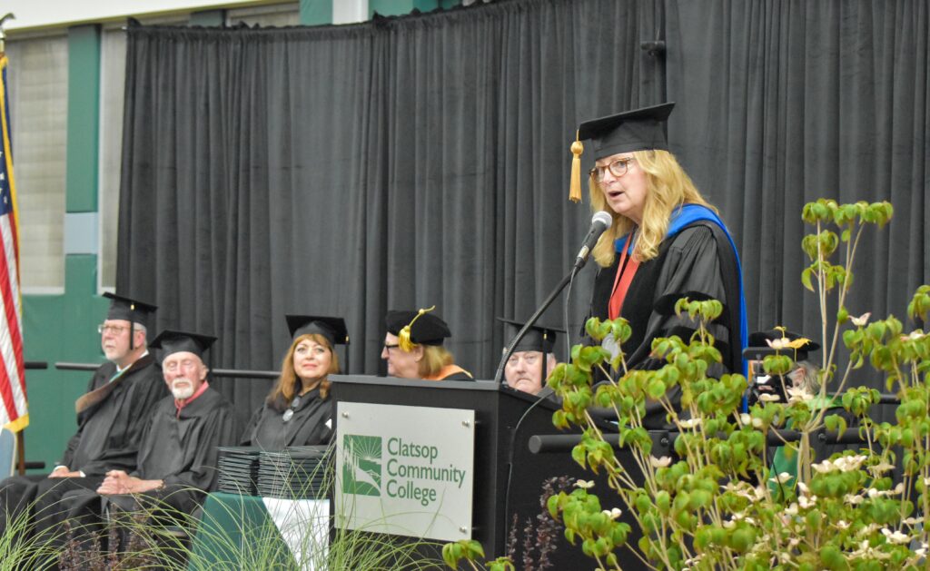 Faculty Marshal Julie Brown addresses the college graduates of 2023