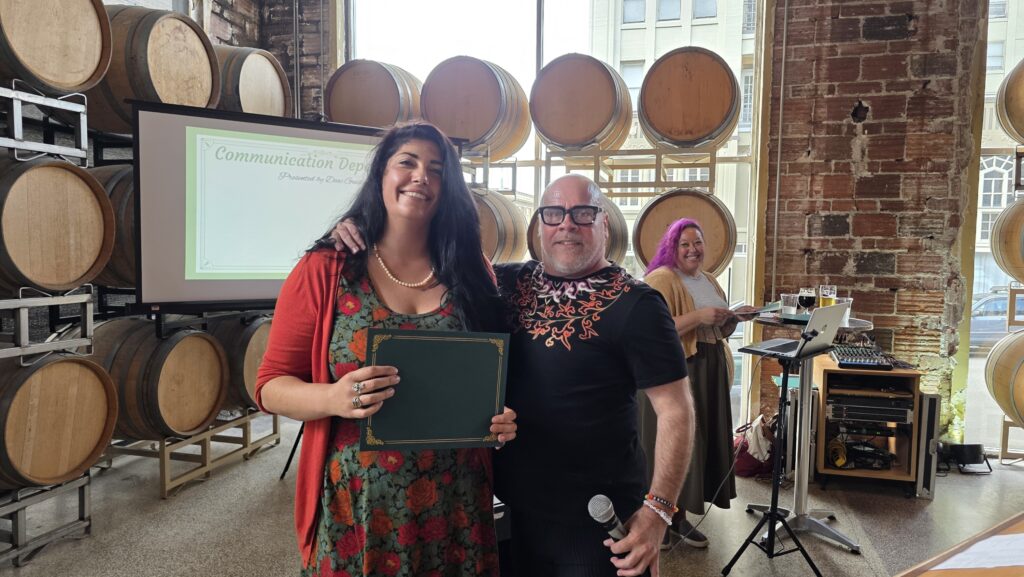 Communications Department Award winner Rocio Carbonell with Instructor Deac Guidi