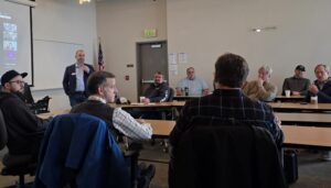 Maritime industry leaders discussing at large table