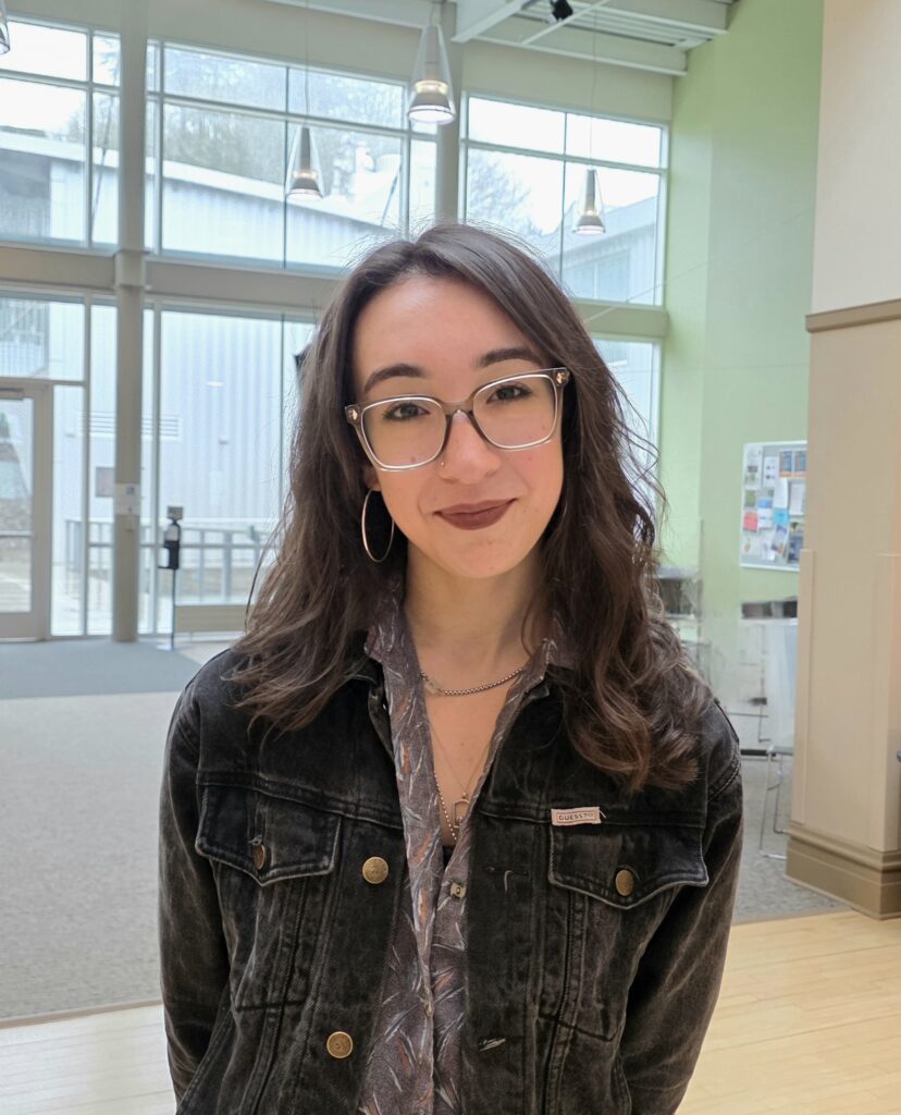 Fiona Hackett stands in Towler Hall