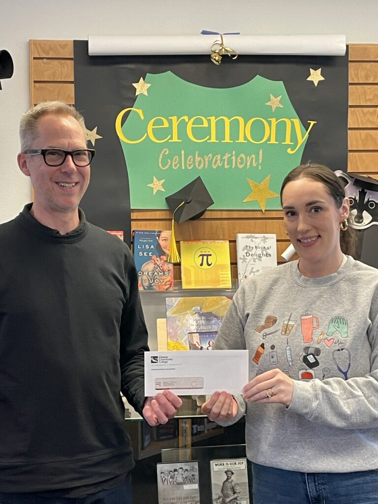 Bethany Fritz with Library Director Dan McClure