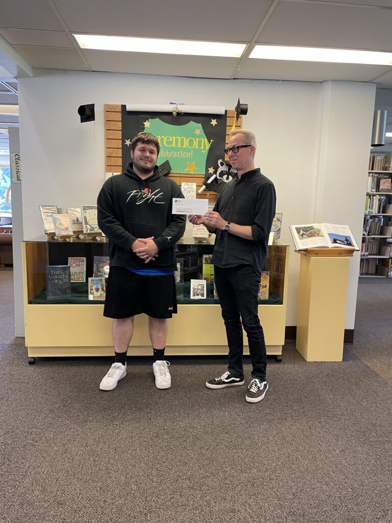 Cutter Sandstrom with Library Director Dan McClure