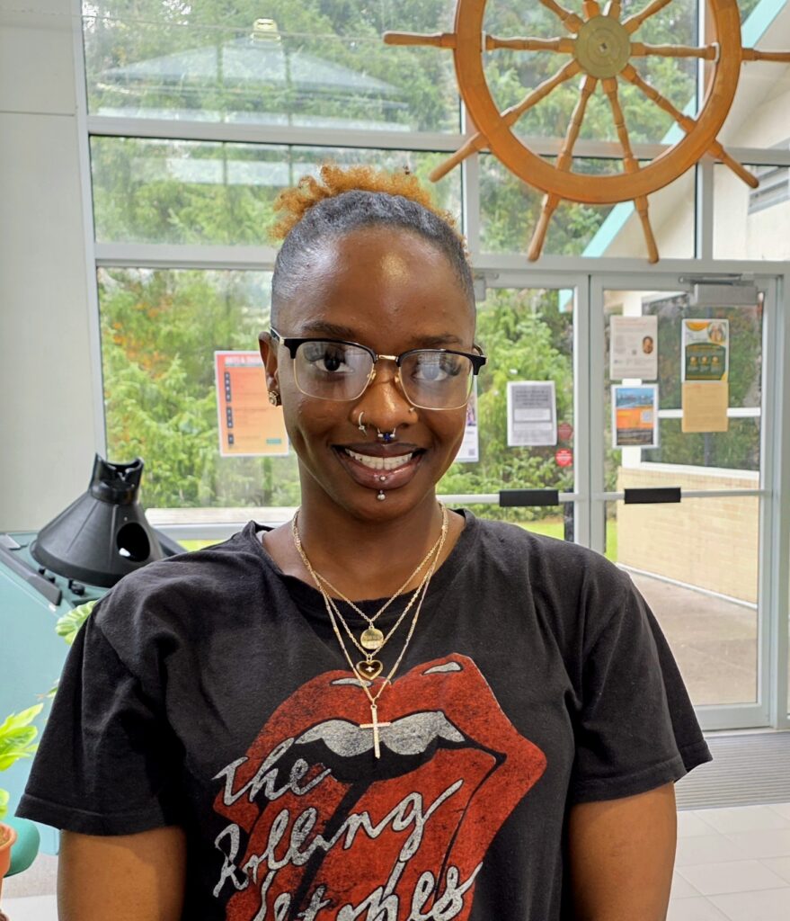 Fa'nase Hill standing in the Maritime Science building