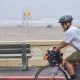 Fernando Rojas Galvan riding his bike at the Seaside Promenade