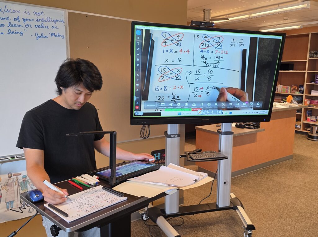 GED Math Instructor Kyle Fujisawa teaches with the HyFlex technology