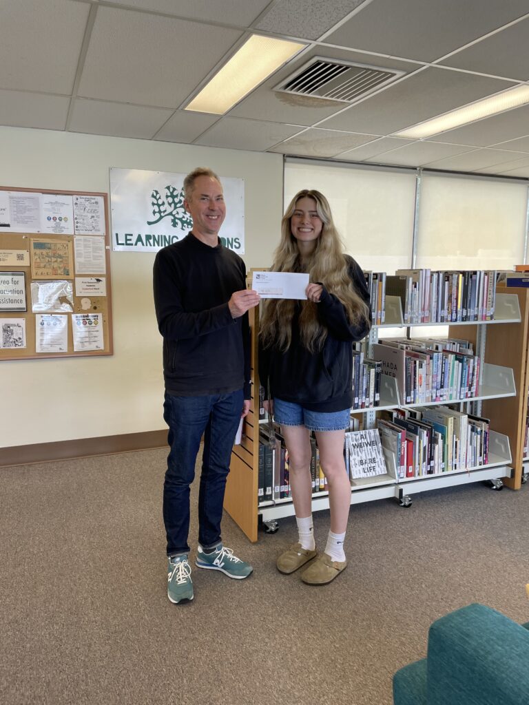 Mia McFadden with Library Director Dan McClure