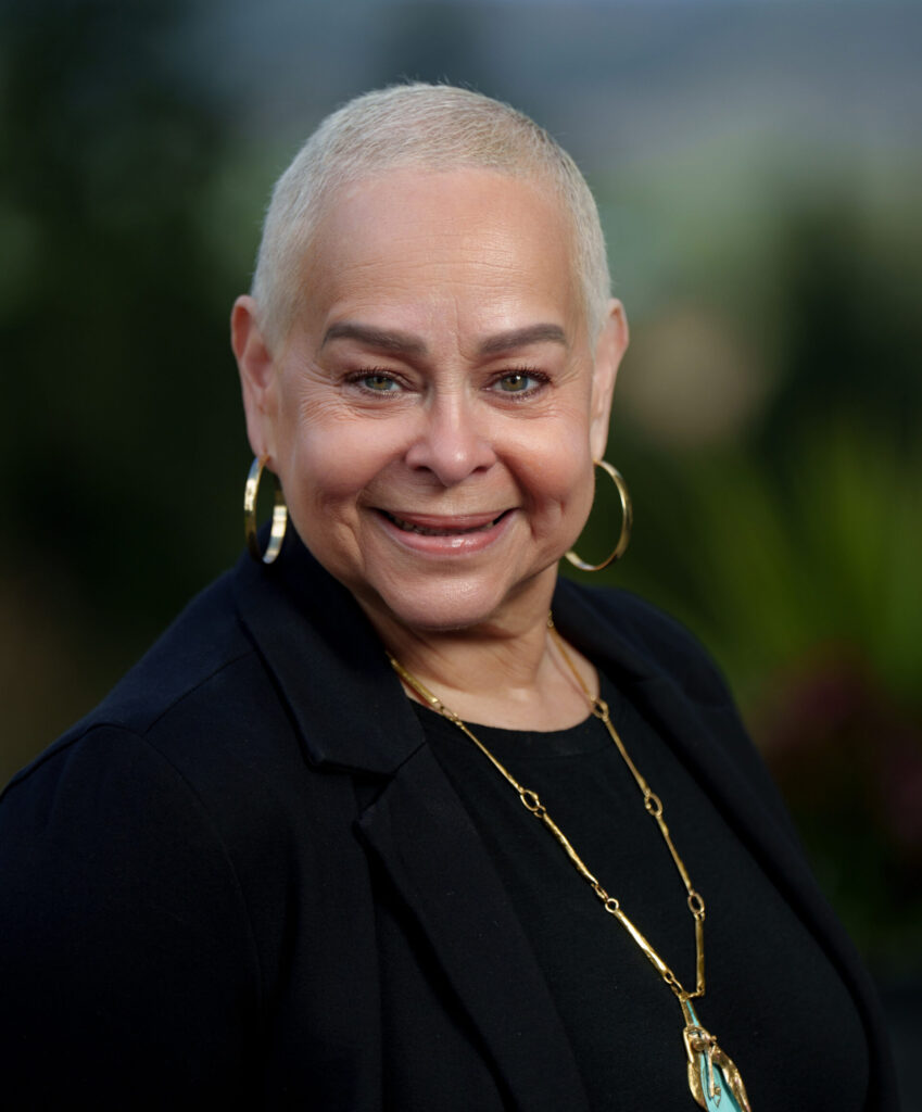 Norma Hernandez portrait photo smiling at the camara