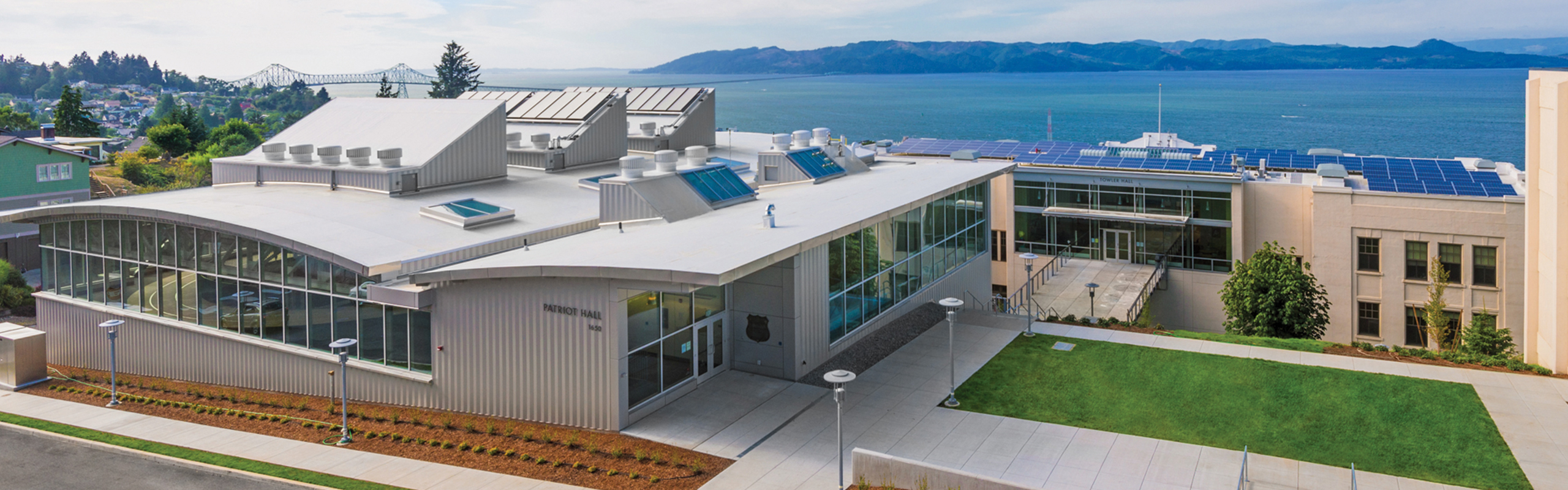 image looking down on the college campus with water in teh background