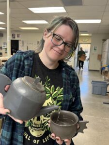 CCC Art Student Cheltzy showing her work in ceramics